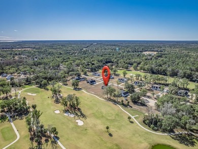 Move-in Ready! Exquisite new construction overlooking hole 6 of on Wildwood Country Club in Florida - for sale on GolfHomes.com, golf home, golf lot