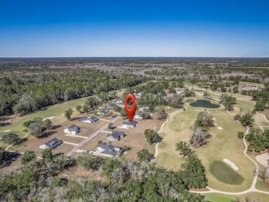 Move-in Ready! Exquisite new construction overlooking hole 6 of on Wildwood Country Club in Florida - for sale on GolfHomes.com, golf home, golf lot