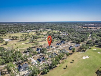 Move-in Ready! Exquisite new construction overlooking hole 6 of on Wildwood Country Club in Florida - for sale on GolfHomes.com, golf home, golf lot