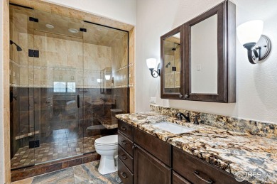 Enjoy the ease of main-floor AND upper-level ensuite living in on Coal Creek Golf Course in Colorado - for sale on GolfHomes.com, golf home, golf lot