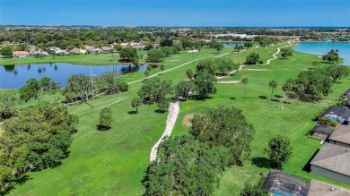 Welcome to 9023 Raes Creek Place, a tremendous home in Palmetto on Imperial Lakewoods Golf Club in Florida - for sale on GolfHomes.com, golf home, golf lot