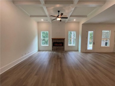 Stunning 2-story home with a 3rd car garage in a coveted on Traditions of Braselton Golf Club in Georgia - for sale on GolfHomes.com, golf home, golf lot