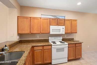 One of the best private lots paired with one of Sun City Grand's on Sun City Grand Golf Couse and Club in Arizona - for sale on GolfHomes.com, golf home, golf lot