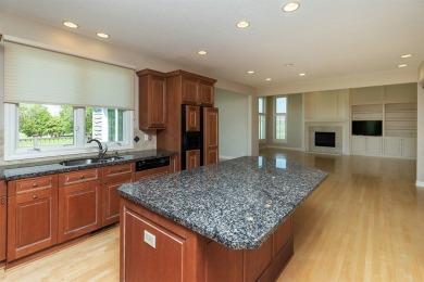 Enjoy luxury living in this stunning executive 1.5-story on Glen Oaks Country Club in Iowa - for sale on GolfHomes.com, golf home, golf lot