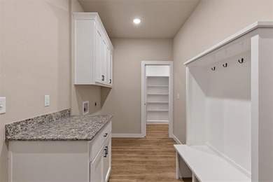 Experience modern living surrounded by nature! This brand-new on Bella Vista Country Club - Scottsdale in Arkansas - for sale on GolfHomes.com, golf home, golf lot