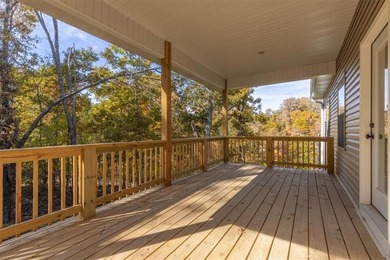 Experience modern living surrounded by nature! This brand-new on Bella Vista Country Club - Scottsdale in Arkansas - for sale on GolfHomes.com, golf home, golf lot