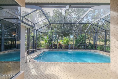 Pristine condition move-in ready pool home on the Golf Course in on Halifax Plantation Golf Club in Florida - for sale on GolfHomes.com, golf home, golf lot