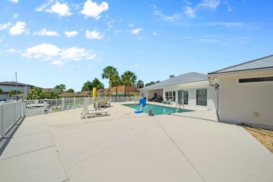 Canal-front home in Bay Point gated community. Gulf Access on Bay Point Resort Golf Club in Florida - for sale on GolfHomes.com, golf home, golf lot