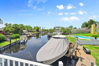 Canal-front home in Bay Point gated community. Gulf Access on Bay Point Resort Golf Club in Florida - for sale on GolfHomes.com, golf home, golf lot