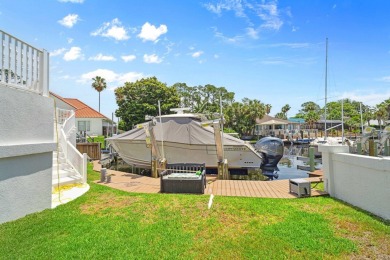 Canal-front home in Bay Point gated community. Gulf Access on Bay Point Resort Golf Club in Florida - for sale on GolfHomes.com, golf home, golf lot