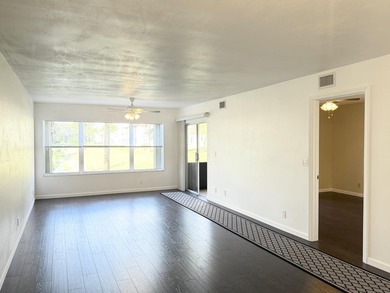 Beautifully renovated spacious 2-bedroom, 2-bath first-floor on Fountains Golf and Country Club in Florida - for sale on GolfHomes.com, golf home, golf lot