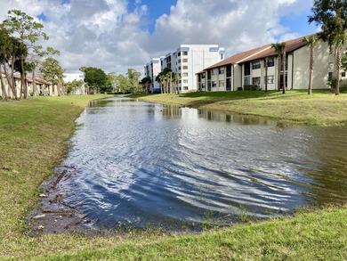 Beautifully renovated spacious 2-bedroom, 2-bath first-floor on Fountains Golf and Country Club in Florida - for sale on GolfHomes.com, golf home, golf lot