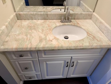 Beautifully renovated spacious 2-bedroom, 2-bath first-floor on Fountains Golf and Country Club in Florida - for sale on GolfHomes.com, golf home, golf lot