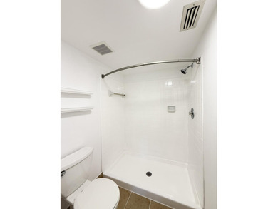 Beautifully renovated spacious 2-bedroom, 2-bath first-floor on Fountains Golf and Country Club in Florida - for sale on GolfHomes.com, golf home, golf lot