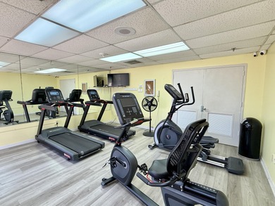 Beautifully updated spacious 2-bedroom, 2-bath first-floor condo on Fountains Golf and Country Club in Florida - for sale on GolfHomes.com, golf home, golf lot