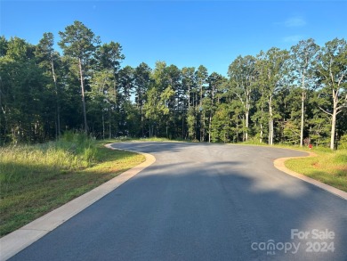 Waterfront lot with Long range views located just off the main on The Tillery Tradition Country Club in North Carolina - for sale on GolfHomes.com, golf home, golf lot