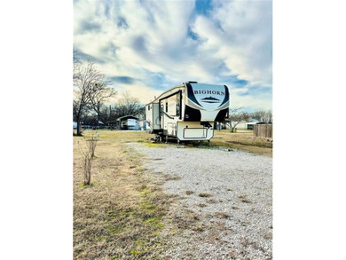 Lake Fork living starts here in the gated community of Holiday on Links At Lands End in Texas - for sale on GolfHomes.com, golf home, golf lot