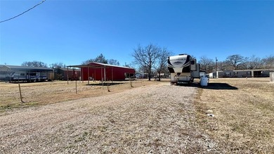 Lake Fork living starts here in the gated community of Holiday on Links At Lands End in Texas - for sale on GolfHomes.com, golf home, golf lot