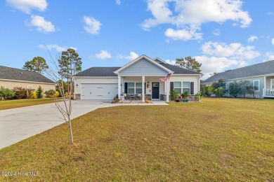 Welcome to this almost-new, stunning single-story home nestled on Bear Trail Golf Club in North Carolina - for sale on GolfHomes.com, golf home, golf lot