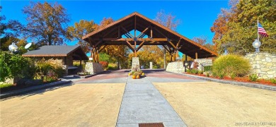 tep into the epitome of luxurious living at The Estates of on The Club At Old Kinderhook in Missouri - for sale on GolfHomes.com, golf home, golf lot