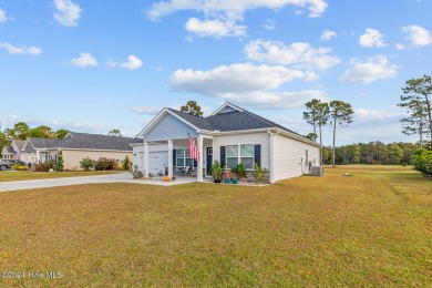 Welcome to this almost-new, stunning single-story home nestled on Bear Trail Golf Club in North Carolina - for sale on GolfHomes.com, golf home, golf lot