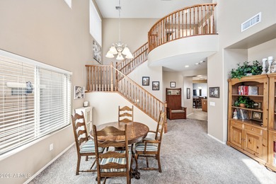 Welcome home to this spacious five-bedroom, three-bath home in on Poston Butte Golf Club in Arizona - for sale on GolfHomes.com, golf home, golf lot