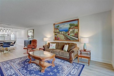 Enjoy resort-style living in Wynmoor's sought-after Antigua I on Wynmoor Golf Course in Florida - for sale on GolfHomes.com, golf home, golf lot