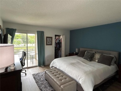 Enjoy resort-style living in Wynmoor's sought-after Antigua I on Wynmoor Golf Course in Florida - for sale on GolfHomes.com, golf home, golf lot