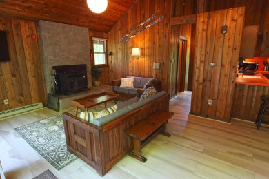 This home is perfect if you like wood.  The lot is loaded with on Hermitage Club Golf Course in Vermont - for sale on GolfHomes.com, golf home, golf lot