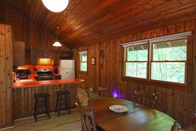 This home is perfect if you like wood.  The lot is loaded with on Hermitage Club Golf Course in Vermont - for sale on GolfHomes.com, golf home, golf lot