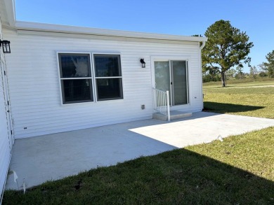 2 BEDROOM, 2 BATHROOM, PARLOR This New Palm Harbor Carriage on Scotland Yards Golf Club in Florida - for sale on GolfHomes.com, golf home, golf lot