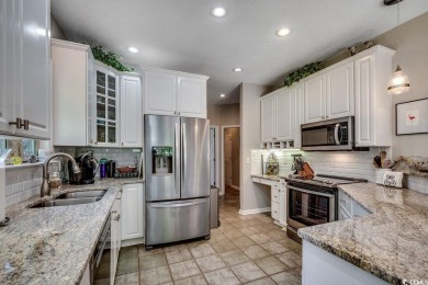 Welcome to this renovated, stunning 3-bedroom, 3-bath home on Tidewater Golf Club and Plantation in South Carolina - for sale on GolfHomes.com, golf home, golf lot