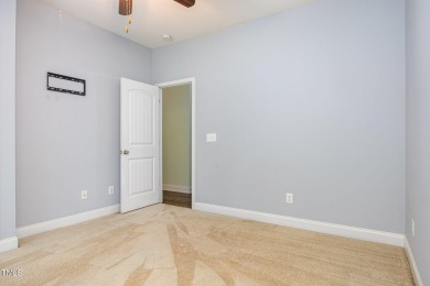 Welcome to this beautiful 1.5 story ranch home in the desirable on Olde Liberty Golf and Country Club in North Carolina - for sale on GolfHomes.com, golf home, golf lot