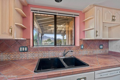 Stunning Santa Rita Mountain Views - Location, Location on Canoa Hills Golf Course in Arizona - for sale on GolfHomes.com, golf home, golf lot