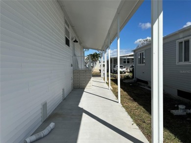 WATERFRONT living at its finest! HIGH & DRY!!! This lovely 2 on Mangrove Bay Golf Course in Florida - for sale on GolfHomes.com, golf home, golf lot