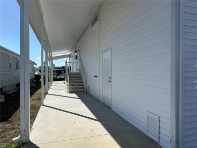 WATERFRONT living at its finest! HIGH & DRY!!! This lovely 2 on Mangrove Bay Golf Course in Florida - for sale on GolfHomes.com, golf home, golf lot