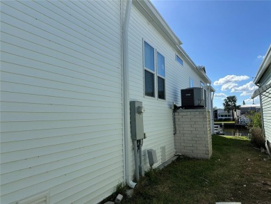 WATERFRONT living at its finest! HIGH & DRY!!! This lovely 2 on Mangrove Bay Golf Course in Florida - for sale on GolfHomes.com, golf home, golf lot