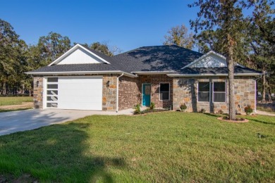 Welcome to your dream home in the sought-after golf & lake on Star Harbor Golf Club in Texas - for sale on GolfHomes.com, golf home, golf lot