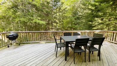 This home is perfect if you like wood.  The lot is loaded with on Hermitage Club Golf Course in Vermont - for sale on GolfHomes.com, golf home, golf lot