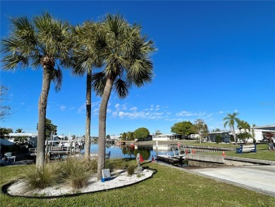 WATERFRONT living at its finest! HIGH & DRY!!! This lovely 2 on Mangrove Bay Golf Course in Florida - for sale on GolfHomes.com, golf home, golf lot