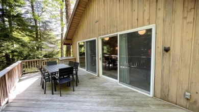 This home is perfect if you like wood.  The lot is loaded with on Hermitage Club Golf Course in Vermont - for sale on GolfHomes.com, golf home, golf lot