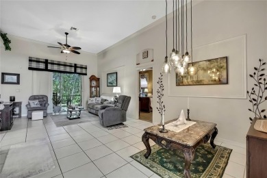 Such a beautiful home to enjoy from the gorgeous front door, and on Glen Lakes Country Club in Florida - for sale on GolfHomes.com, golf home, golf lot