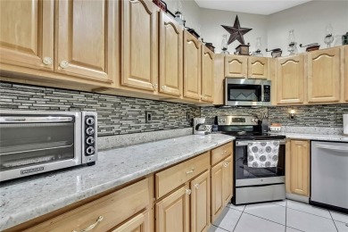 Such a beautiful home to enjoy from the gorgeous front door, and on Glen Lakes Country Club in Florida - for sale on GolfHomes.com, golf home, golf lot