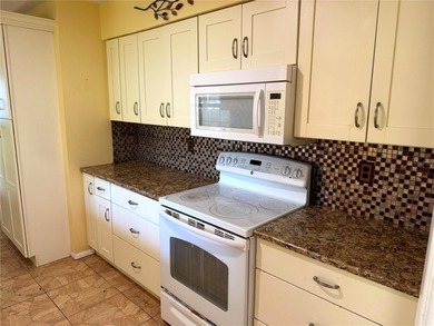 ESTATE SALE and priced to move!!!  Village Green Golf Club on Village Green Golf Club of Sarasota in Florida - for sale on GolfHomes.com, golf home, golf lot