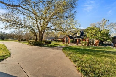 Welcome to your new riverfront home nestled in the prestigious on Pecan Plantation Country Club in Texas - for sale on GolfHomes.com, golf home, golf lot