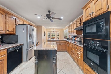 Welcome to your new riverfront home nestled in the prestigious on Pecan Plantation Country Club in Texas - for sale on GolfHomes.com, golf home, golf lot