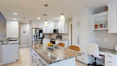 Experience the best of Florida living in this beautifully on Twin Isles Country Club in Florida - for sale on GolfHomes.com, golf home, golf lot