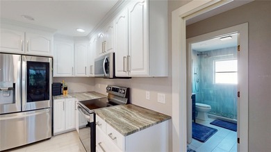 Experience the best of Florida living in this beautifully on Twin Isles Country Club in Florida - for sale on GolfHomes.com, golf home, golf lot