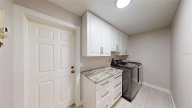 Experience the best of Florida living in this beautifully on Twin Isles Country Club in Florida - for sale on GolfHomes.com, golf home, golf lot