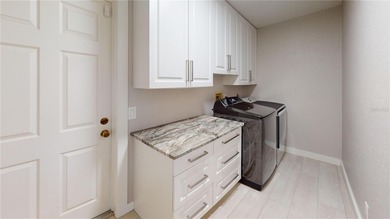 Experience the best of Florida living in this beautifully on Twin Isles Country Club in Florida - for sale on GolfHomes.com, golf home, golf lot